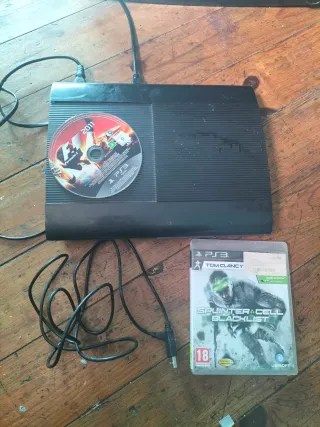 Consola PS3 + Juegos F1 2011 y Splinter Cell