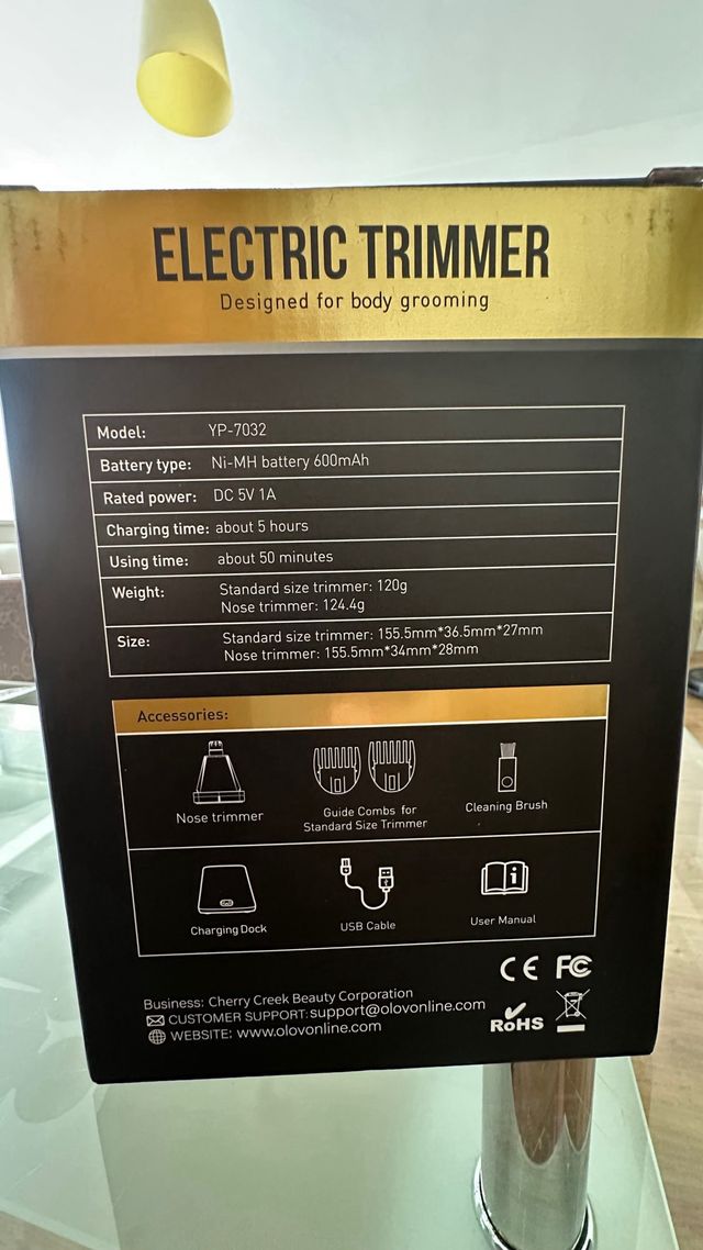 Máquina Cortapelo Olov Inalámbrica Negra y Dorada