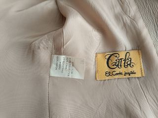 Conjunto chaqueta larga y falda corta, elegantes 