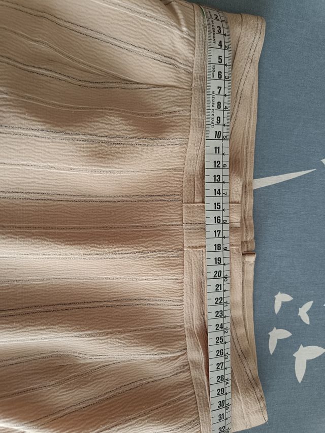 Conjunto chaqueta larga y falda corta, elegantes