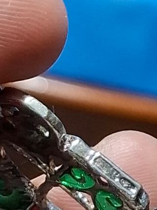 Miniatura culla argento 800 con dettagli colorati