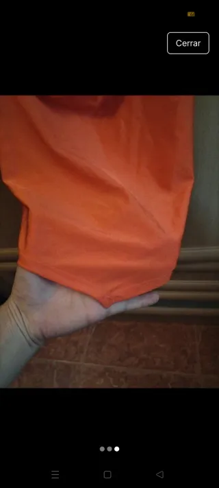 Top naranja corto talla L nuevo