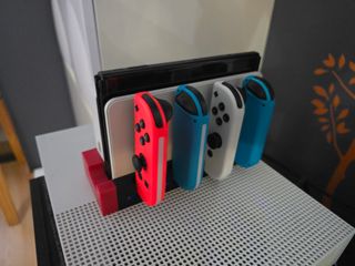 Nintendo Switch OLED con 4 mandos
