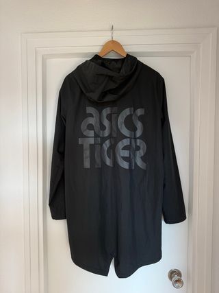 Raro impermeable Asics Tiger contra viento/lluvia