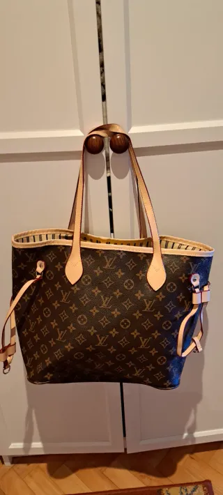 Bolso Louis Vuitton y cartera a juego