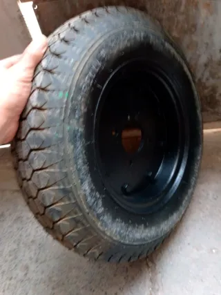 Llanta 10 y neumático Pirelli 4.80-10