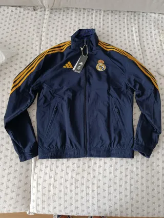Chaqueta Adidas Real Madrid reversible azul/dorada