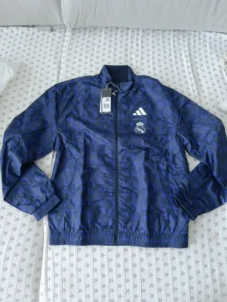 Chaqueta Adidas Real Madrid reversible azul/dorada