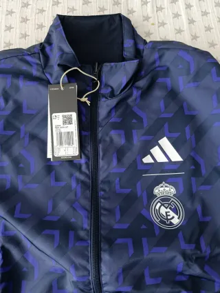 Chaqueta Adidas Real Madrid reversible azul/dorada