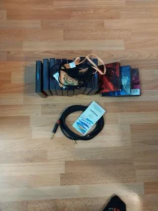 Lote tangas y cable de audio