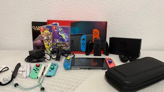 Nintendo Switch + Pokémon Púrpura y Splatoon 3