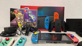 Nintendo Switch + Pokémon Púrpura y Splatoon 3