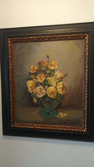 Cuadro de flores amarillas con marco dorado