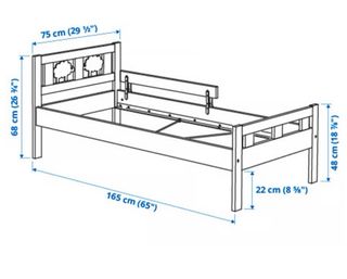 Cama infantil blanca con barrera