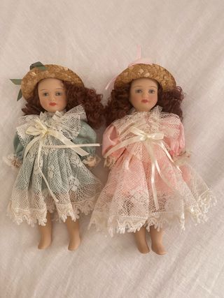 Bambole in ceramica vestite