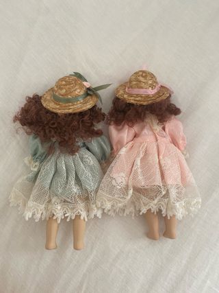 Bambole in ceramica vestite