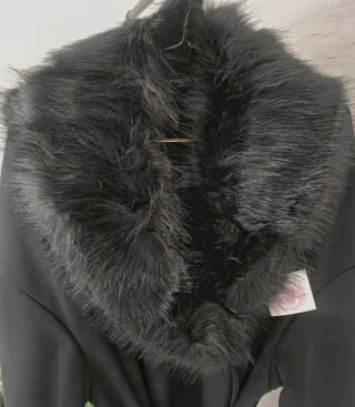 Estola de pelo negra