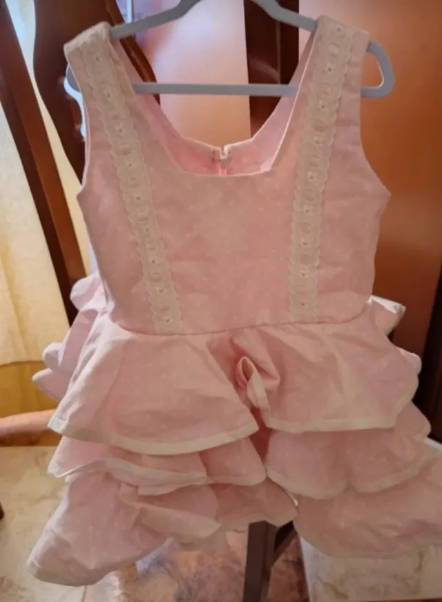 Conjunto vestido y chaqueta rosa bebé