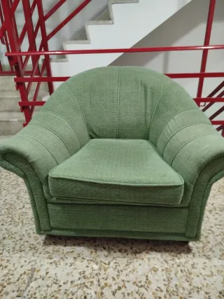 Sillón de tela verde