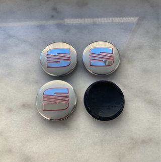 Tapabujes Seat 56mm Plata Nuevos