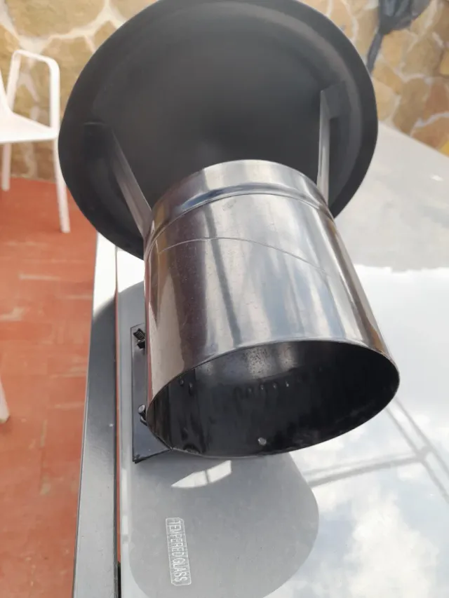 Caperuza chimenea leña metal negra