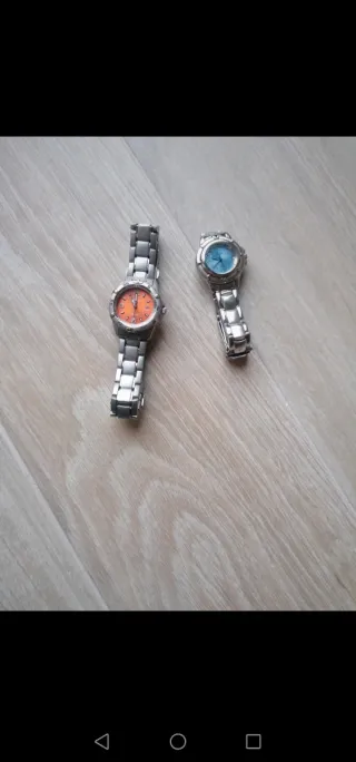 Lote 2 Relojes Festina y Guess