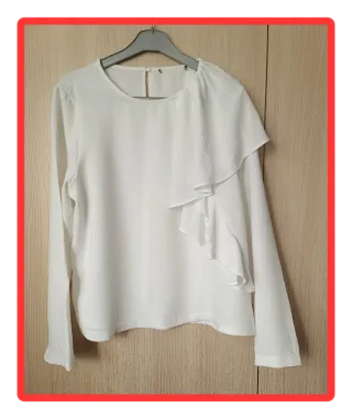Blusa blanca con volantes