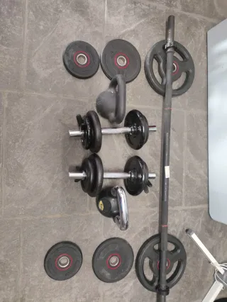 Pesas y Barra de Gimnasio.
Correas TRX Decathlon 