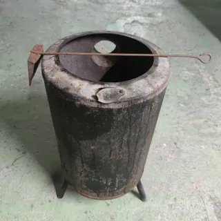 Estufa leña redonda metal falta circulo superior