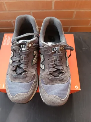 Zapatillas New Balance Gris y Plateado