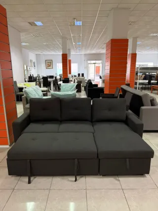 Sofá cama gris de tela