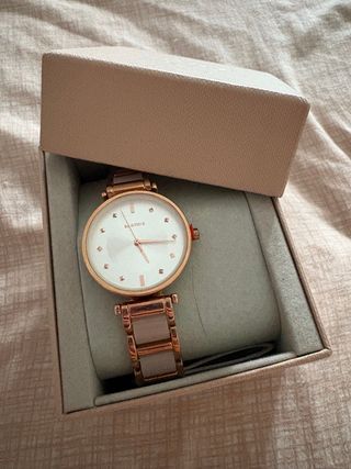 Reloj Parfois rosa y dorado