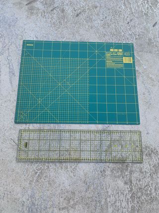 Tabla cortar y regla costura 60cm
sin usar