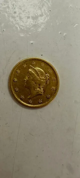 Dólar de oro antiguo