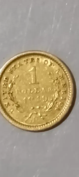 Dólar de oro antiguo