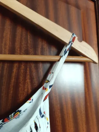 Camiseta tirantes con flecos y estampado