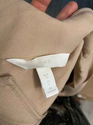 Mono beige mujer