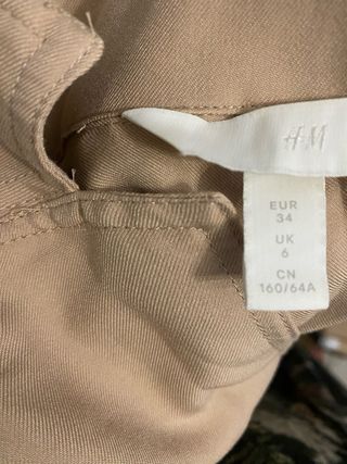 Mono beige mujer