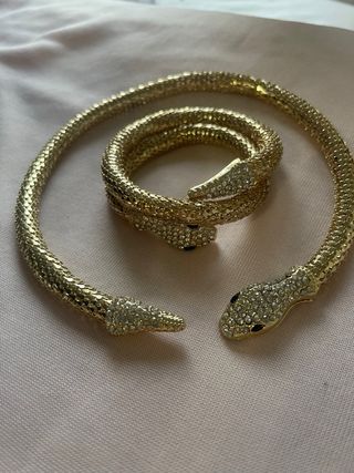 Collar y pulsera serpiente dorada