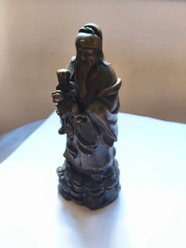 Figura cobre Santo Chino con niño