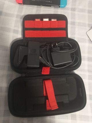 Nintendo Switch con juegos y cargador