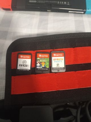 Nintendo Switch con juegos y cargador