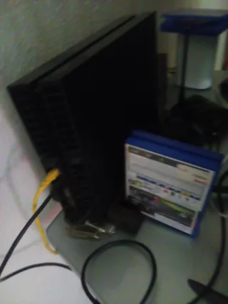 PS4 (PlayStation 4) + 6 Juegos