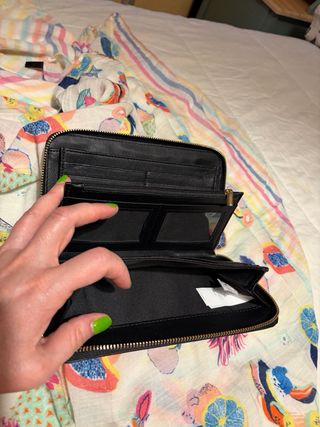 Cartera de mano efecto piel serpiente