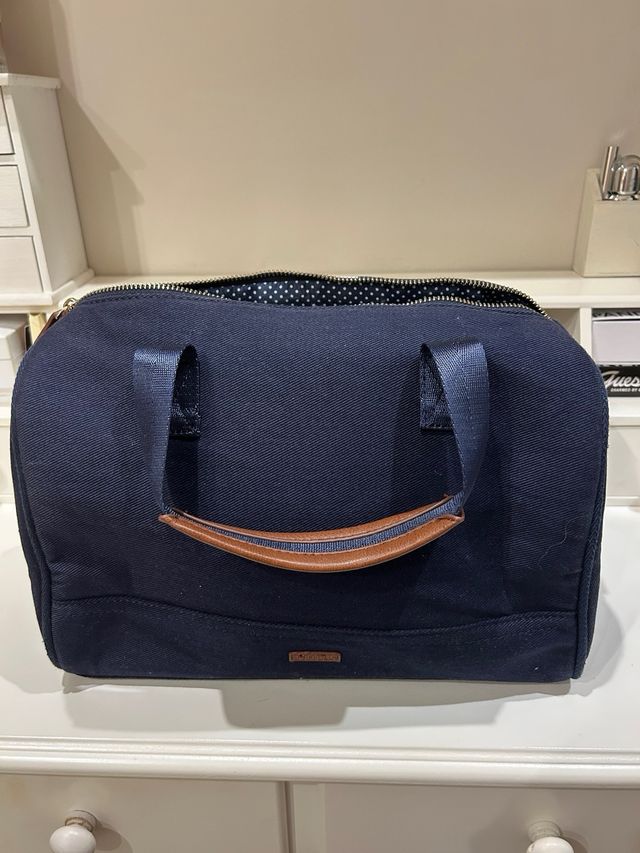 Bolso azul marino con rayas