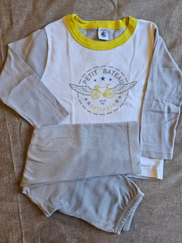 Pijama invierno niño Petit Bateau bicicleta
