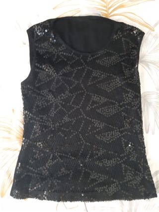 Top sin mangas de lentejuelas. Nuevo. Color negro.