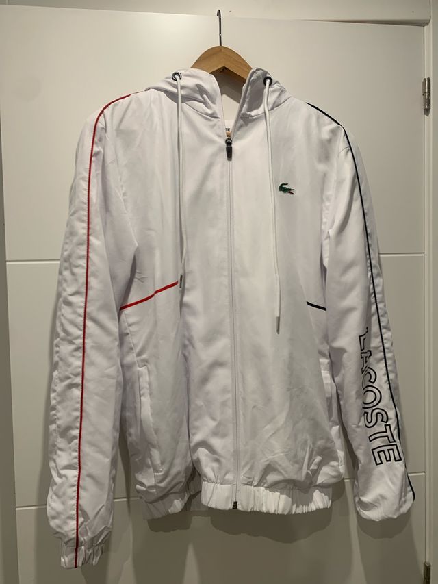 Chaqueta deportiva Lacoste blanca con detalles