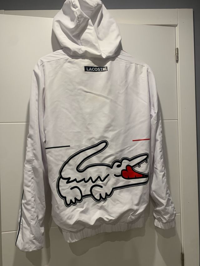 Chaqueta deportiva Lacoste blanca con detalles