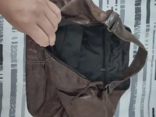 Bolso de viaje marrón